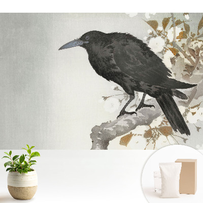 Fototapeta na wymiar do sypialni Subtelny kruk na tle kwitnących gałęzi