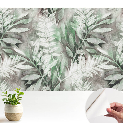 Fototapeta z nadrukiem samoprzylepna Delikatne liście akwarelowe w zieleni.