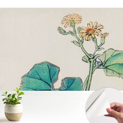 Fototapeta do salonu Delikatny kwiat na tle zielonych liści