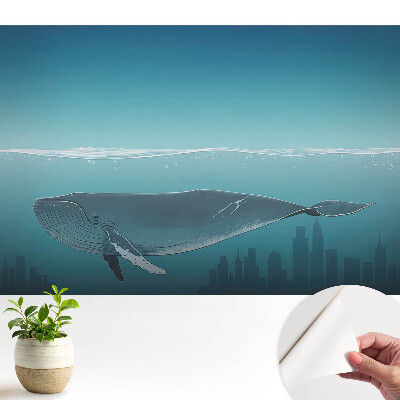 Tapeta fotograficzna samoprzylepna Wieloryb i miasto o zachodzie słońca