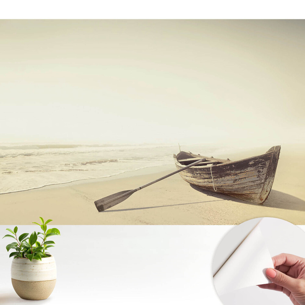 Fototapeta do salonu Spokojna łódź na plaży