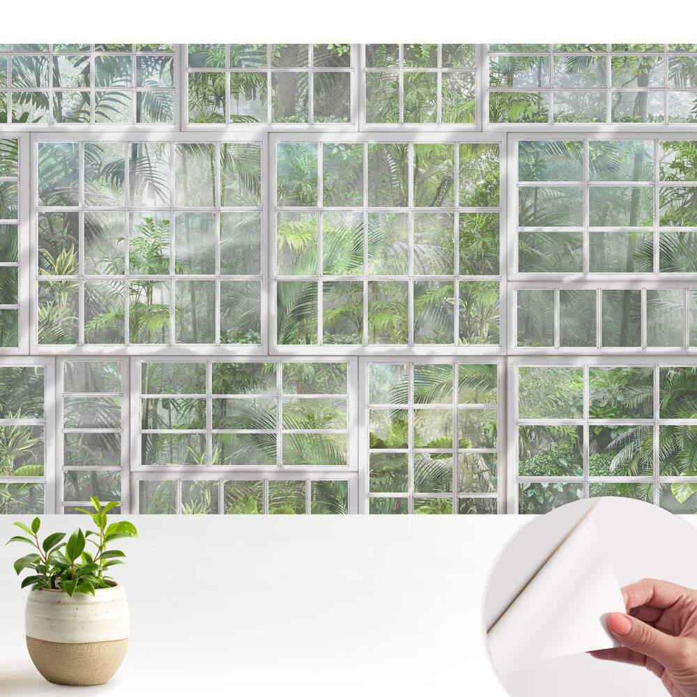 Tapeta fotograficzna samoprzylepna Zielona dżungla za białymi oknami