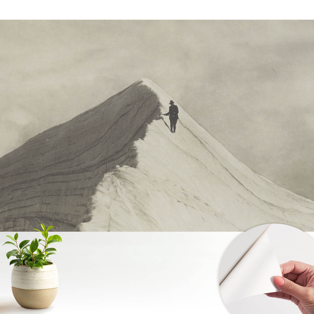 Fototapeta do salonu Górski szczyt i samotny wspinacz