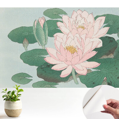 Fototapeta do salonu Kwiaty lotosu na zielonych liściach