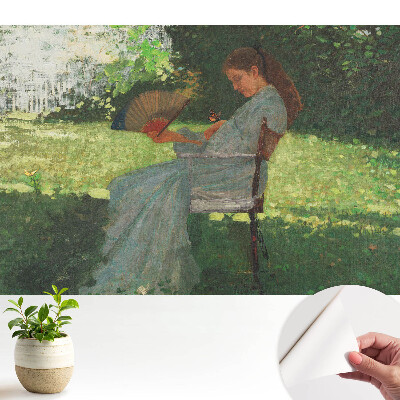 Fototapeta do salonu Kobieta z wachlarzem w ogrodzie czuje harmonię