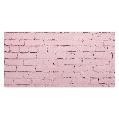 Mata ochronna na biurko Pastelowa ściana cegieł