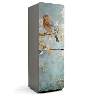 Naklejka tapeta na lodówkę Ptak na gałęzi z kwiatami
