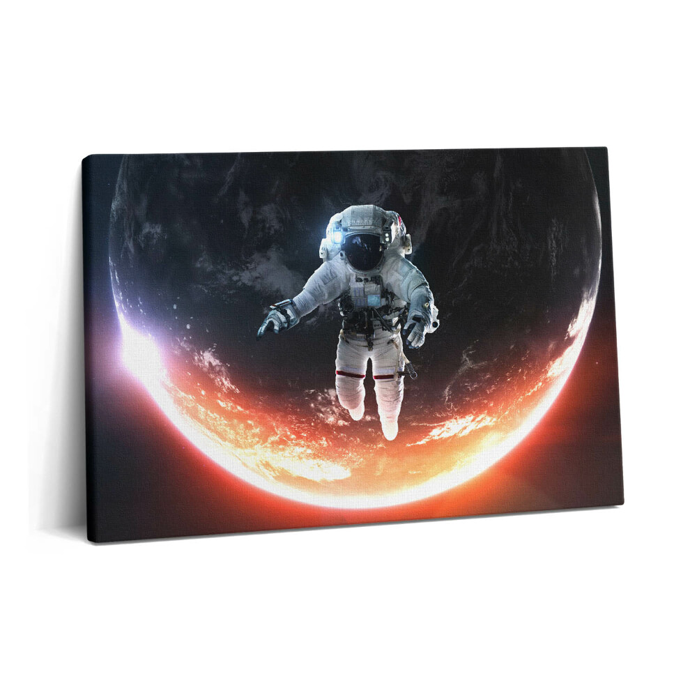 Obraz canvas 60x40 Astronauta w kosmosie