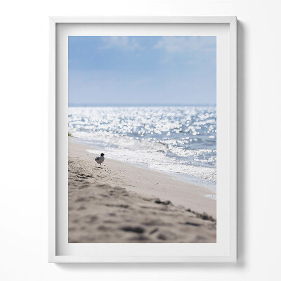 Obraz w ramce Morskie fale i ptak na plaży