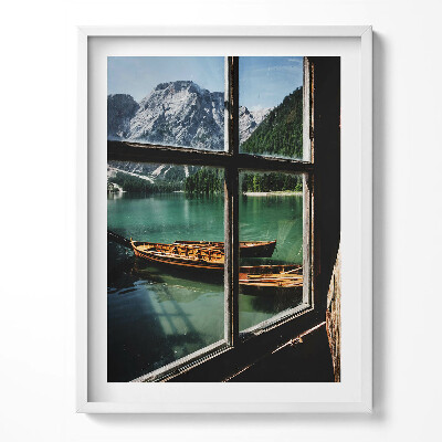 Obraz w ramce Widok z okna na jezioro z łódką