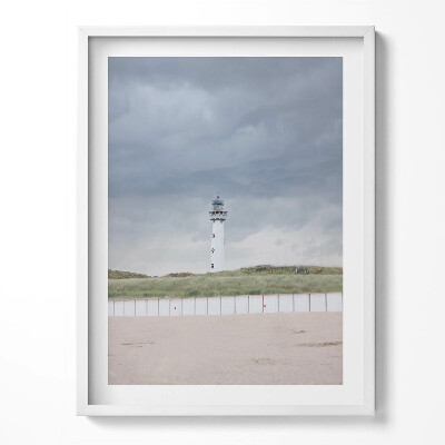 Obraz w ramce Samotna latarnia morska na plaży