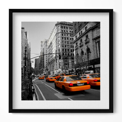 Obraz w drewnianej ramce Ruch taksówek aleją na Manhattanie