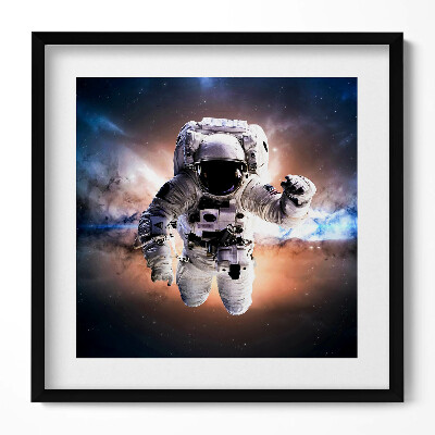 Obraz w drewnianej ramce Astronauta w przestrzeni kosmicznej