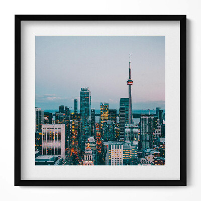 Obraz w drewnianej ramce Panorama miasta wieczorem