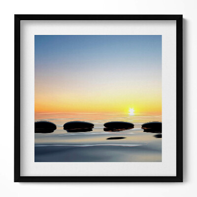 Obraz w drewnianej ramce Kamienie na wodzie o wschodzie słońca - zen