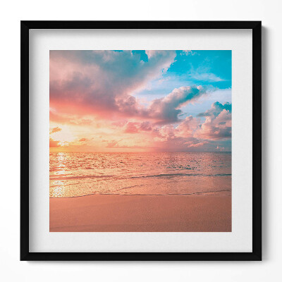 Obraz w drewnianej ramce Romantyczny zachó słońca nad morzem