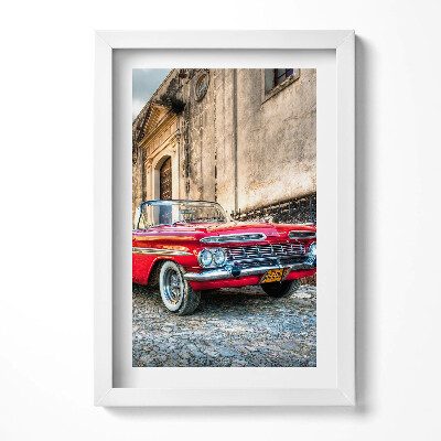 Obraz w ramie Czerwony stary samochód w dzielnicy kolumbijskiej