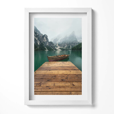 Obraz w ramie Pejzaż - molo łódka jezioro lasy i góry
