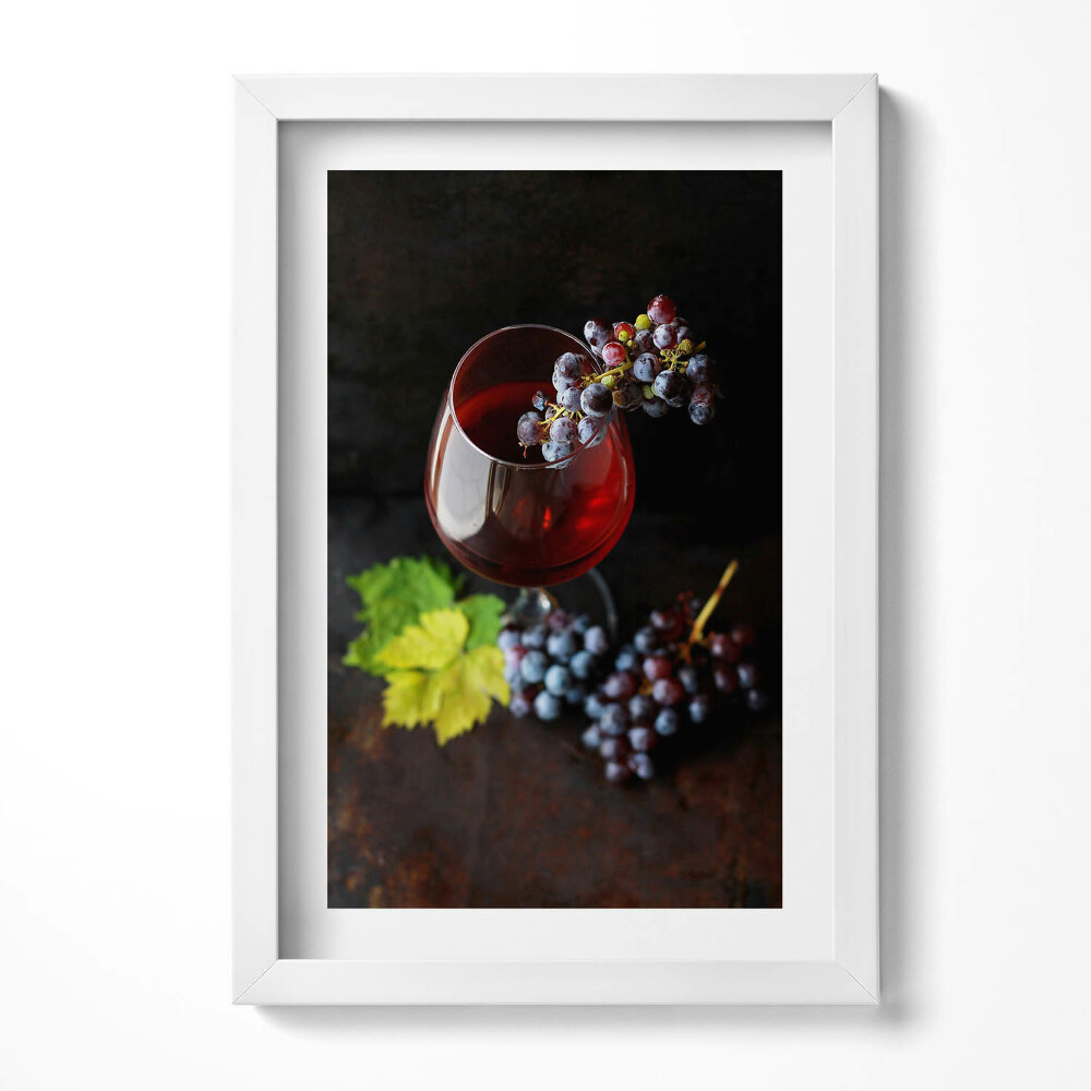 Obraz w ramie Kieliszek wina i winogrona