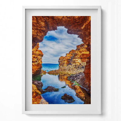 Obraz pionowy Widok spod skał na morze