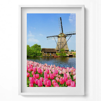 Obraz pionowy Holenderski wiatrak z kwiatami