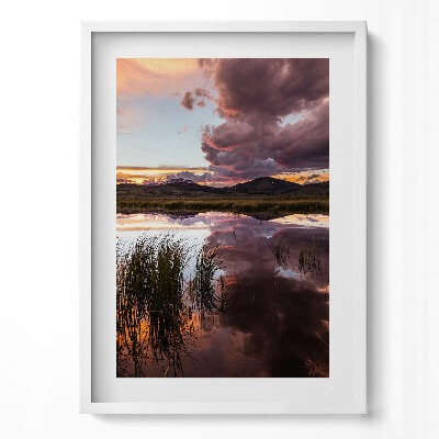 Obraz pionowy Chmury nad jeziorem