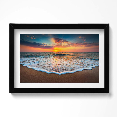 Obraz w ramie Pejzaż zachodzącego słońca nad morzem