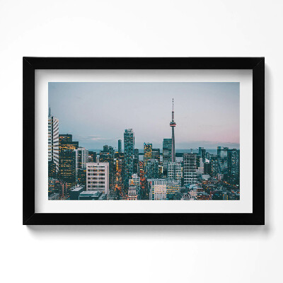 Obraz w ramie Panorama miasta wieczorem