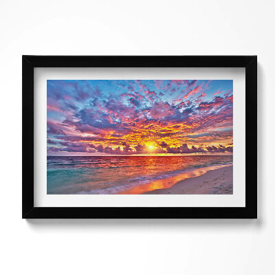 Obraz w ramie Zachód słońca nad morzem