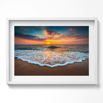 Obraz w ramie Pejzaż zachodzącego słońca nad morzem