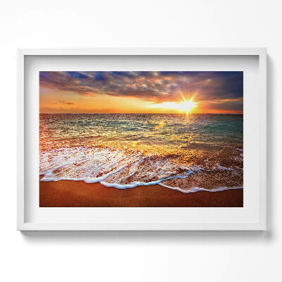 Obraz w ramie Fale morza o zachodzie słońca