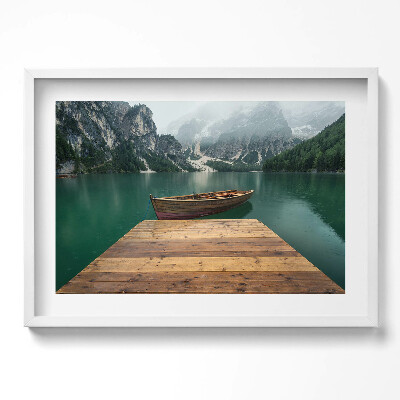 Obraz w ramie Pejzaż - molo łódka jezioro lasy i góry