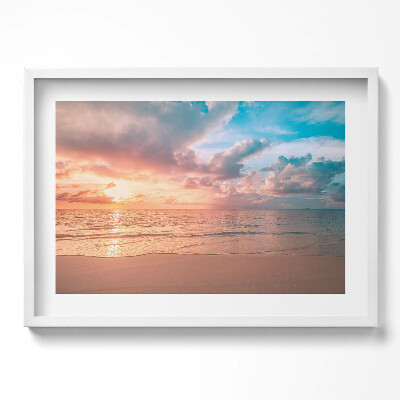 Obraz w ramie Romantyczny zachó słońca nad morzem